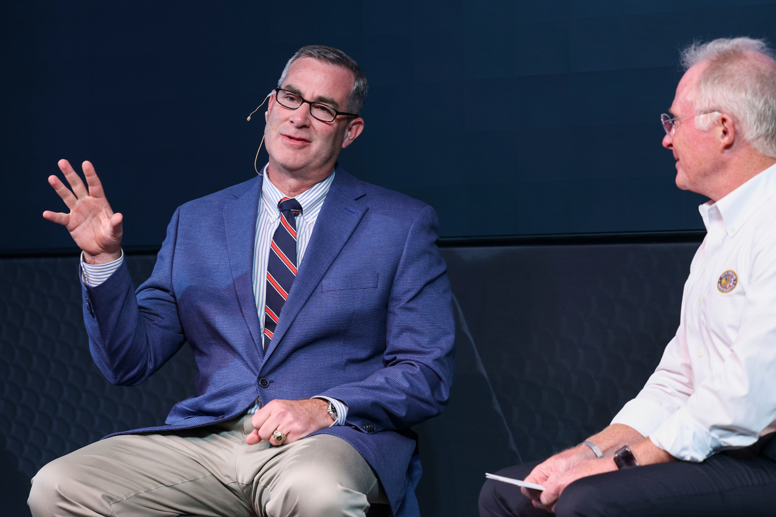 West Point dean and brigadier general Shane Reeves in conversation with retired general Tony “T2” Thomas, former commander of SOCOM. Photo by Ben Hider.